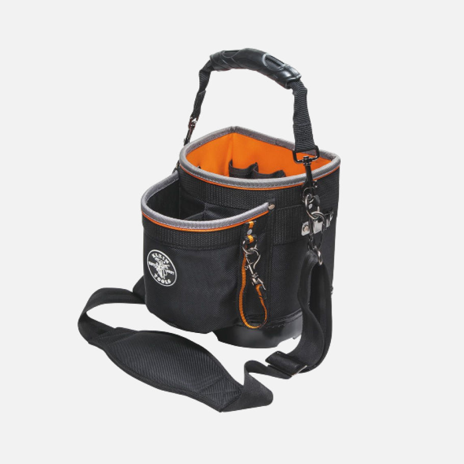 Black and orange tool bag on a light grey background.